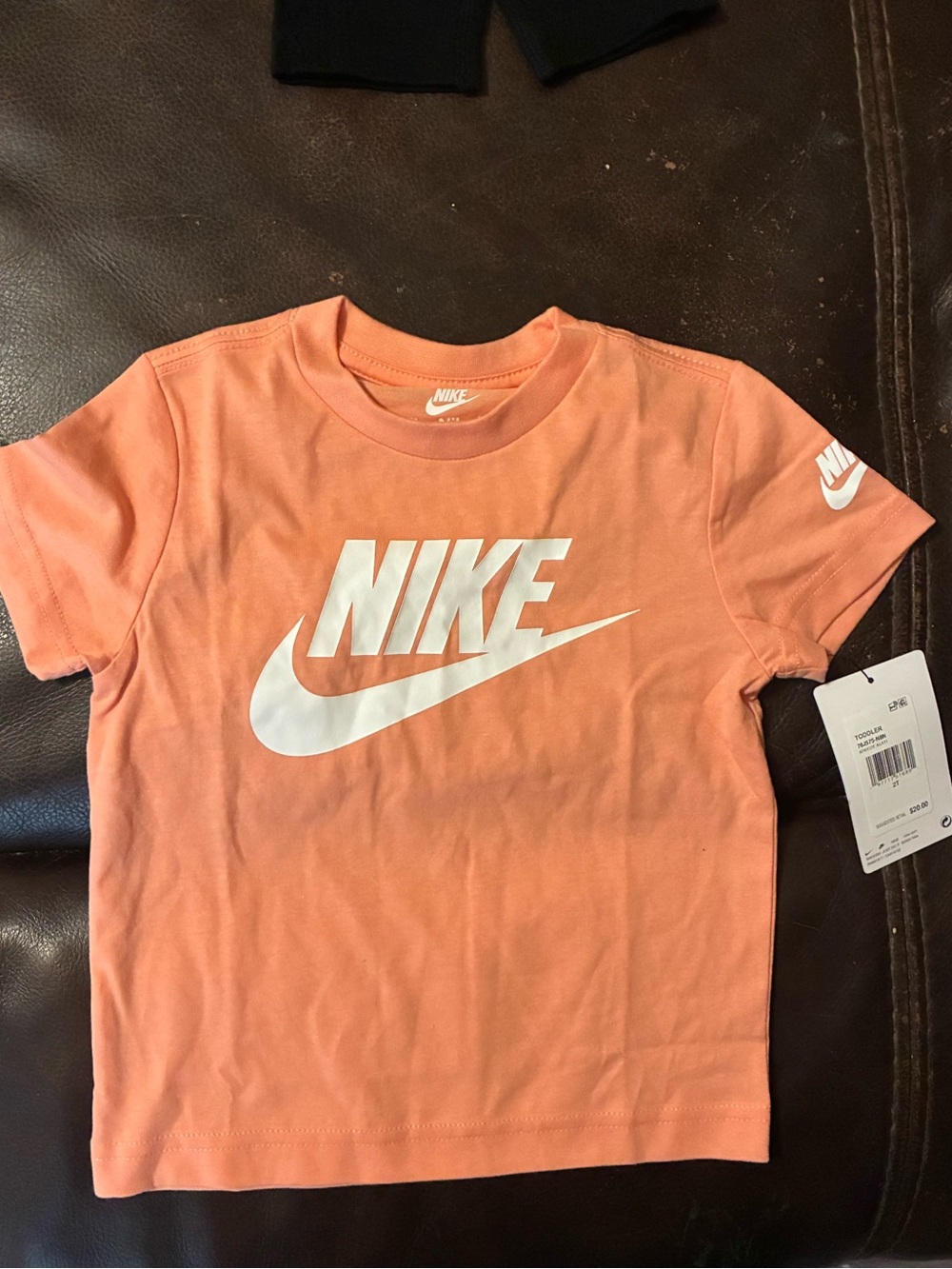 BNWT Nike Kids Short Sleeve Tee in Peach with White Logo
